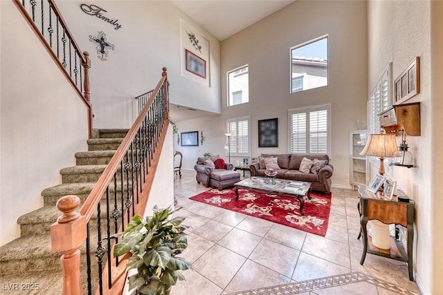 2733 Auchmull St, Henderson, NV 89044 - living room with stairway, a high ceiling, and tile patterned flooring