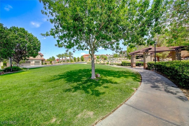 2733 Auchmull St, Henderson, NV 89044 - surrounding community featuring a yard and a pergola