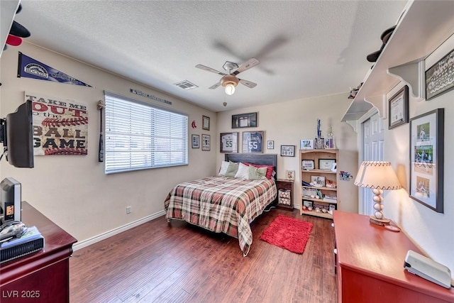 2733 Auchmull St, Henderson, NV 89044 - bedroom featuring wood finished floors, a textured ceiling, and ceiling fan