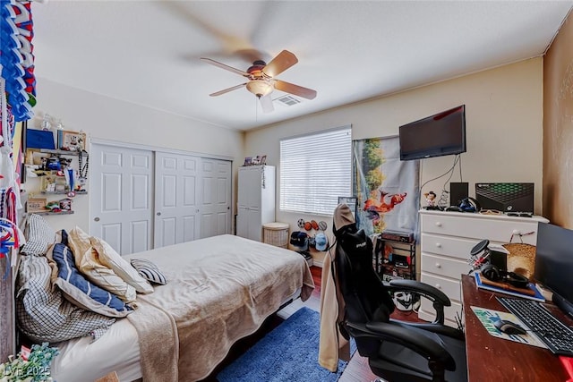 2733 Auchmull St, Henderson, NV 89044 - bedroom featuring a closet, an office area, a ceiling fan, and wood finished floors