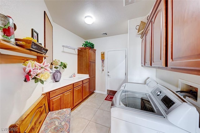 2733 Auchmull St, Henderson, NV 89044 - washroom with washing machine and dryer, light tile patterned floors, and cabinet space