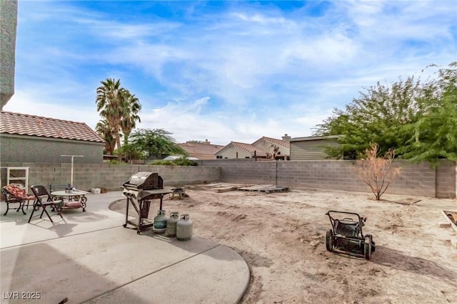 view of yard featuring a fenced backyard and a patio