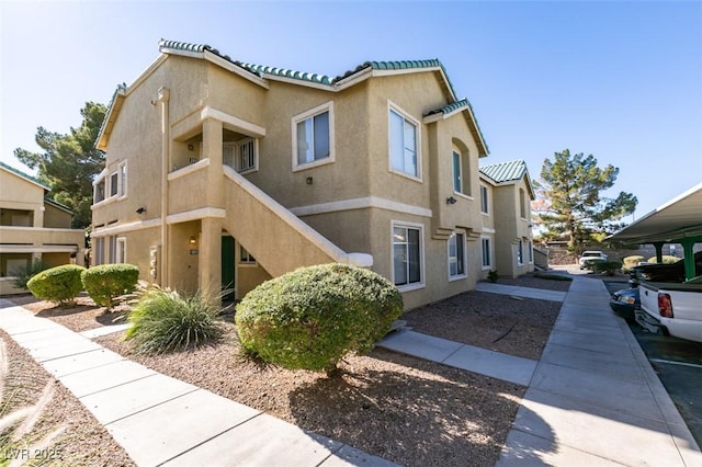 1550 Jamielinn Ln Unit 102, Las Vegas, NV 89110 - view of home's exterior with stucco siding