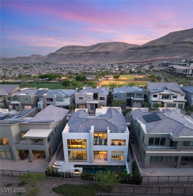 bird's eye view featuring a mountain view and a residential view