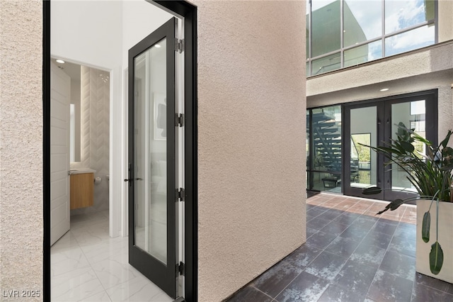 hall featuring french doors