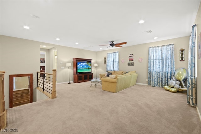 carpeted living room with recessed lighting, visible vents, a ceiling fan, and baseboards