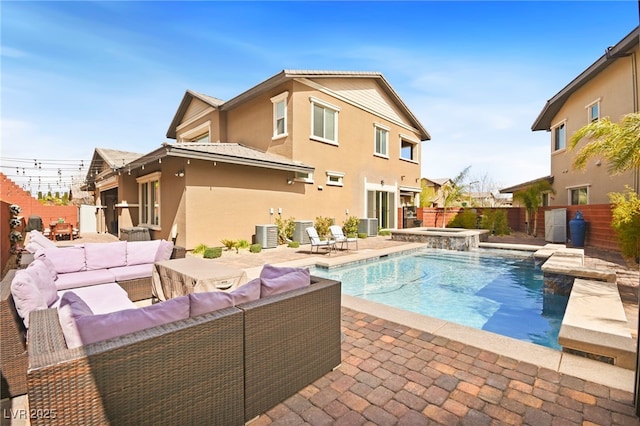 view of swimming pool featuring an outdoor hangout area, a patio area, central AC, and a fenced backyard
