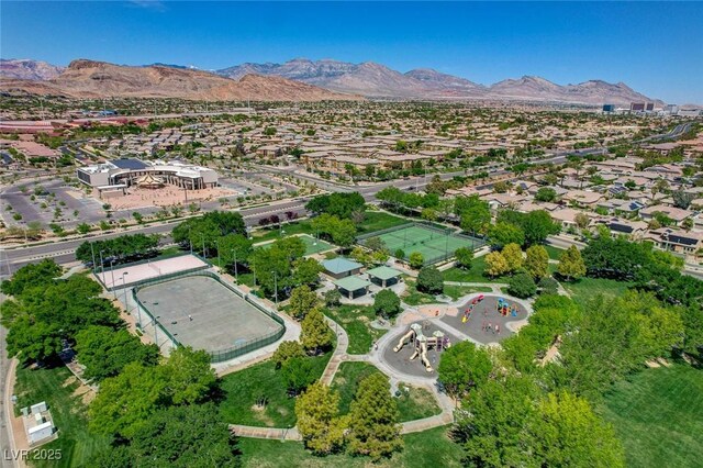 drone / aerial view featuring a residential view and a mountain view