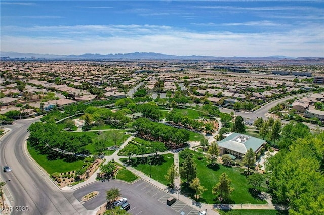 drone / aerial view with a residential view and a mountain view
