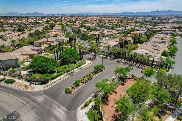 birds eye view of property featuring a mountain view and a residential view