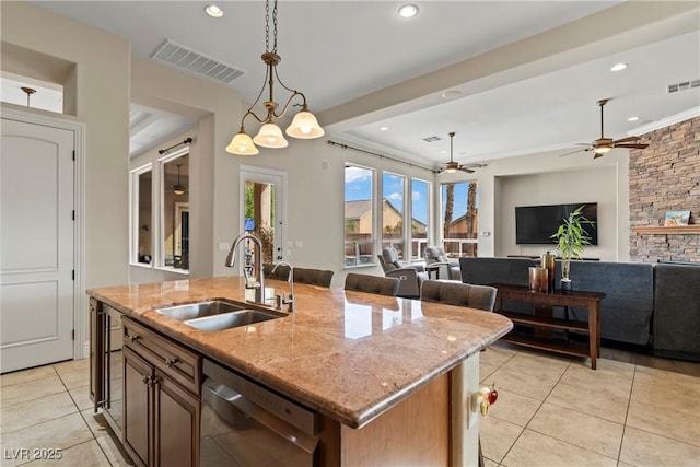 4624 Leon De Oro Dr, Las Vegas, NV 89129 - kitchen featuring dishwasher, a sink, light tile patterned flooring, a ceiling fan, and open floor plan