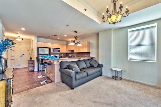 2405 W Serene Ave Unit 703, Las Vegas, NV 89123 - living area with dark colored carpet, baseboards, recessed lighting, a chandelier, and crown molding
