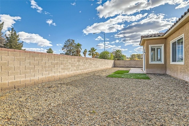 view of yard featuring a fenced backyard