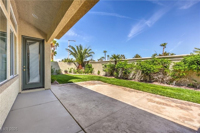 view of patio with a fenced backyard