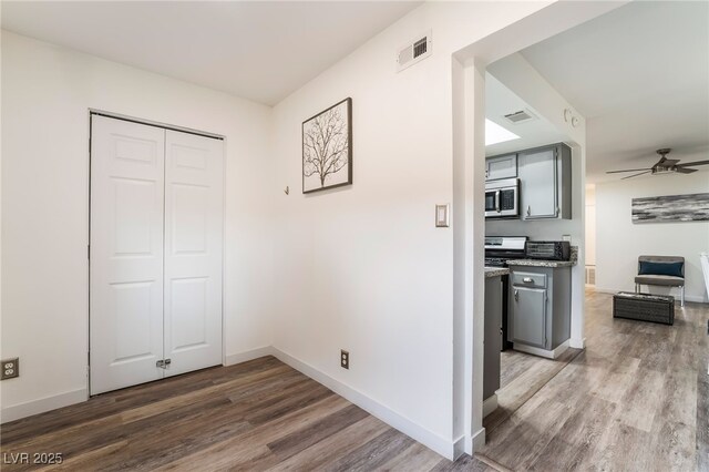 3120 S Eastern Ave Unit 5, Las Vegas, NV 89169 - interior space featuring baseboards, wood finished floors, and visible vents