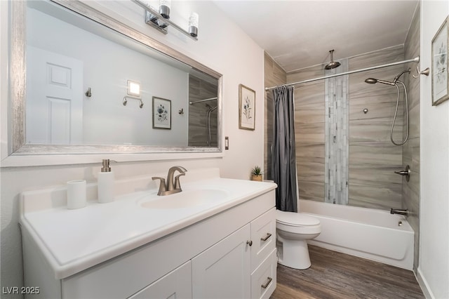 3120 S Eastern Ave Unit 5, Las Vegas, NV 89169 - bathroom with vanity, a combined bath / shower with rainfall shower, toilet, and wood finished floors
