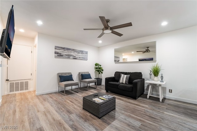 3120 S Eastern Ave Unit 5, Las Vegas, NV 89169 - living area featuring a ceiling fan, visible vents, wood finished floors, baseboards, and recessed lighting