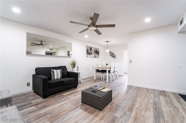 3120 S Eastern Ave Unit 5, Las Vegas, NV 89169 - living room featuring recessed lighting, light wood finished floors, ceiling fan, and baseboards