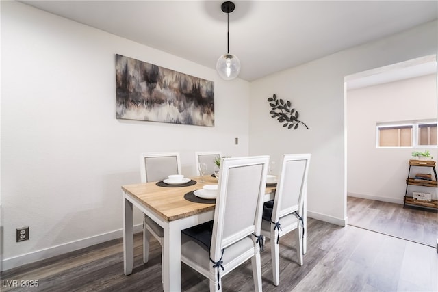 3120 S Eastern Ave Unit 5, Las Vegas, NV 89169 - dining space with baseboards and wood finished floors