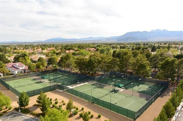 birds eye view of property with a mountain view