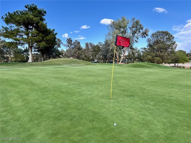 view of home's community featuring view of golf course