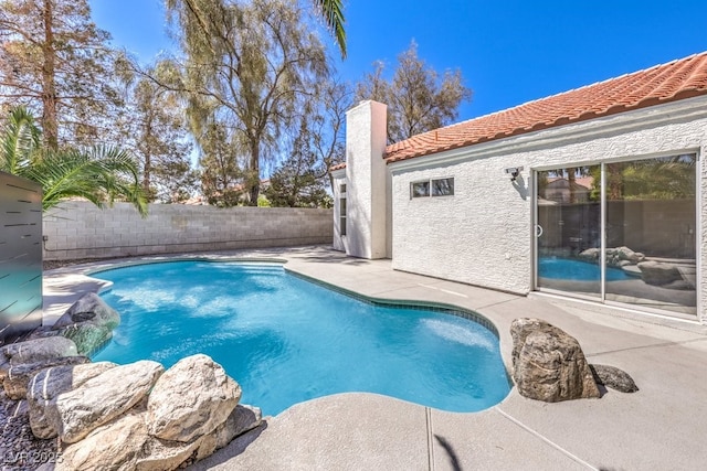 view of pool with a fenced backyard, a patio area, and a fenced in pool