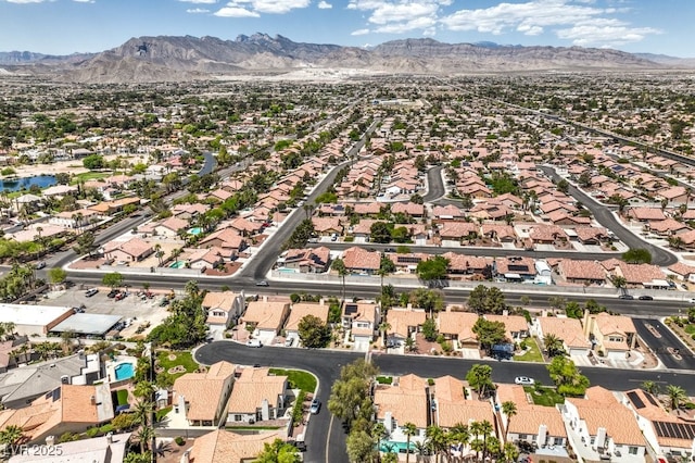 drone / aerial view with a residential view and a mountain view