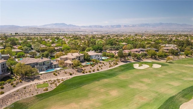 bird's eye view with a residential view, a mountain view, and golf course view