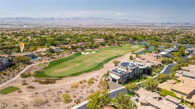 birds eye view of property featuring a water and mountain view, golf course view, and a residential view