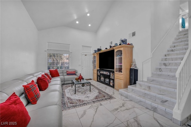 103 Trout Creek Ct, Las Vegas, NV 89123 - living room with light marble finish floors, high vaulted ceiling, stairway, and recessed lighting