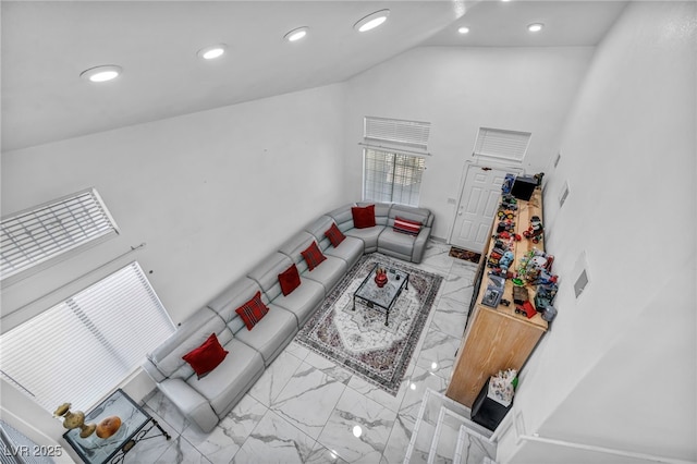 103 Trout Creek Ct, Las Vegas, NV 89123 - living area featuring marble finish floors, vaulted ceiling, and recessed lighting