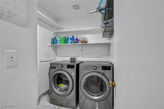103 Trout Creek Ct, Las Vegas, NV 89123 - clothes washing area featuring washing machine and clothes dryer and a textured wall