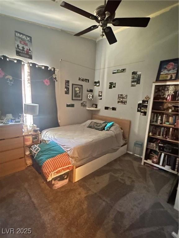 carpeted bedroom featuring a ceiling fan