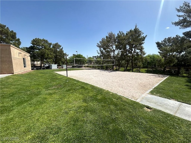 surrounding community with volleyball court and a yard