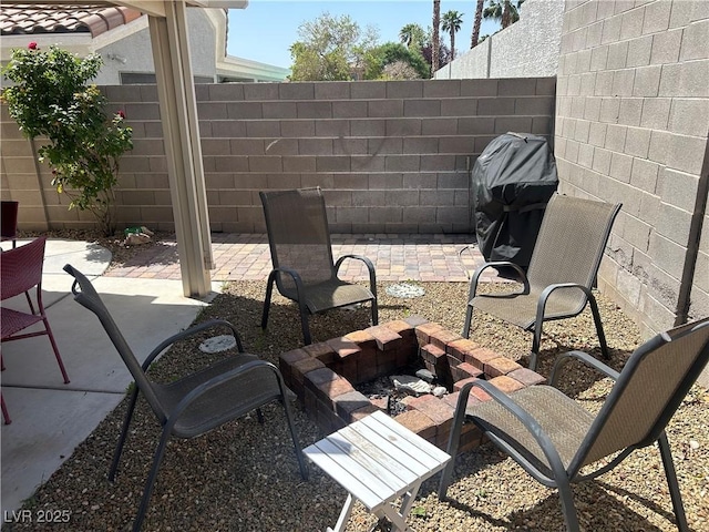 view of patio / terrace featuring fence