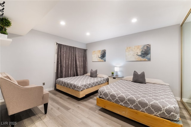 3120 S Eastern Ave Unit 6, Las Vegas, NV 89169 - bedroom with recessed lighting, baseboards, and light wood-type flooring