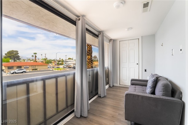 3120 S Eastern Ave Unit 6, Las Vegas, NV 89169 - sitting room with light wood-style floors and visible vents