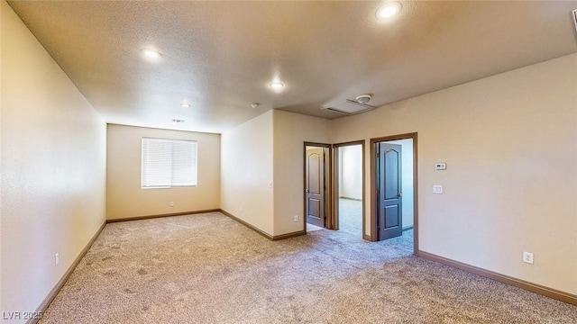 524 Blanche Ct, Henderson, NV 89052 - empty room featuring recessed lighting, light carpet, and baseboards
