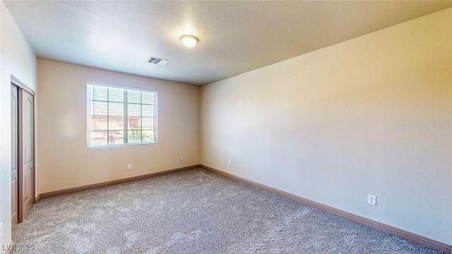 524 Blanche Ct, Henderson, NV 89052 - unfurnished room featuring carpet flooring, a textured ceiling, visible vents, and baseboards