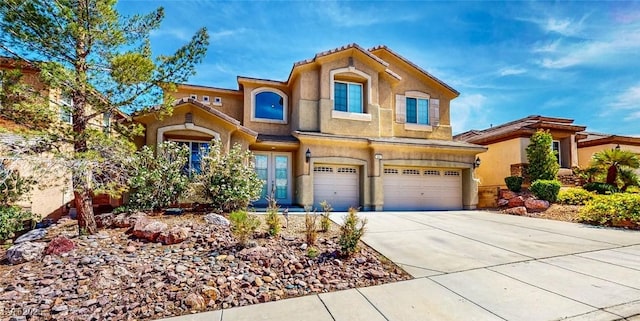 524 Blanche Ct, Henderson, NV 89052 - mediterranean / spanish-style house with a garage, stucco siding, and driveway