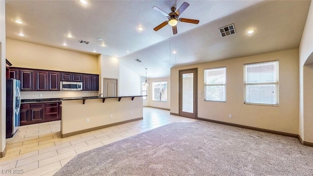 524 Blanche Ct, Henderson, NV 89052 - kitchen featuring a breakfast bar, a ceiling fan, visible vents, appliances with stainless steel finishes, and open floor plan