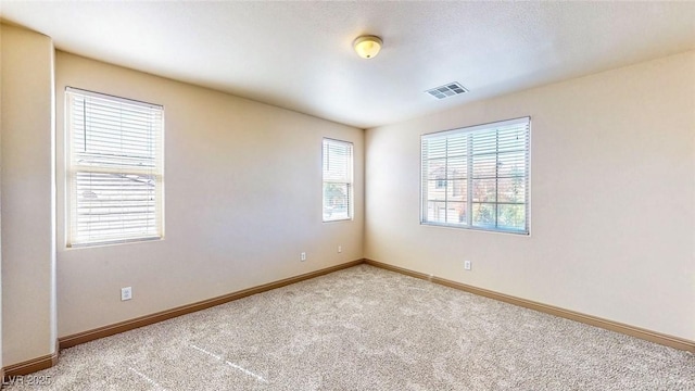 524 Blanche Ct, Henderson, NV 89052 - spare room with visible vents, carpet, and baseboards