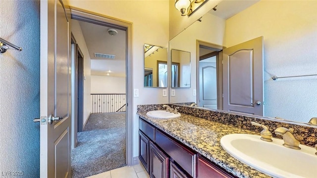 524 Blanche Ct, Henderson, NV 89052 - full bath featuring double vanity, visible vents, tile patterned floors, and a sink