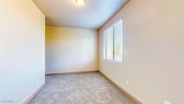 524 Blanche Ct, Henderson, NV 89052 - carpeted empty room with baseboards
