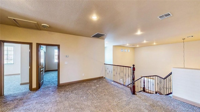 524 Blanche Ct, Henderson, NV 89052 - unfurnished room with a textured ceiling, visible vents, carpet, and baseboards