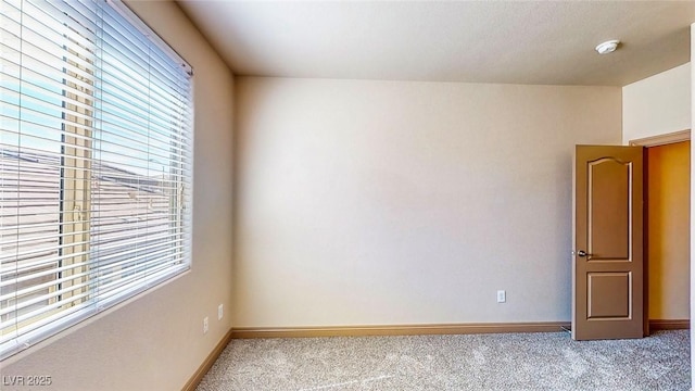 524 Blanche Ct, Henderson, NV 89052 - carpeted spare room with a wealth of natural light and baseboards
