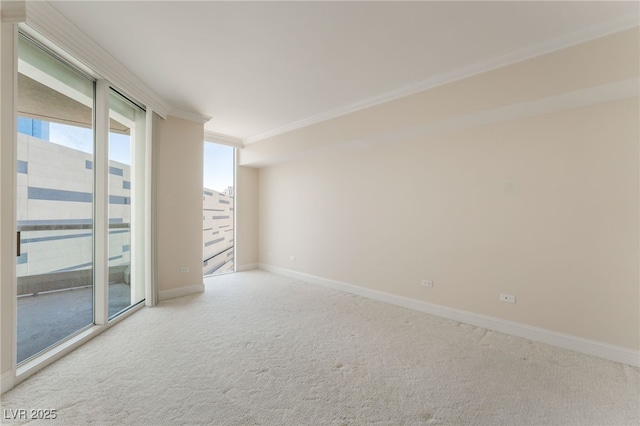 2877 Paradise Rd Unit 1806, Las Vegas, NV 89109 - carpeted spare room featuring ornamental molding and baseboards