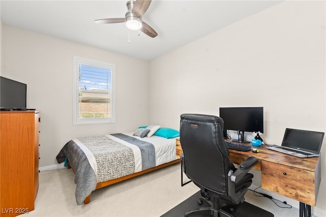 bedroom with baseboards, a ceiling fan, and carpet