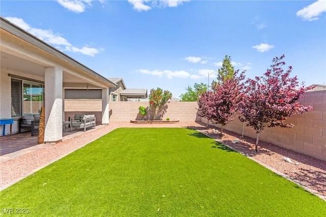 view of yard featuring a fenced backyard and a patio