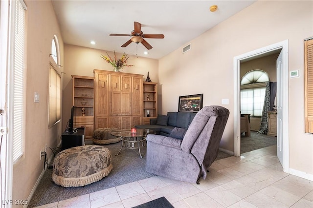 living area with recessed lighting, marble finish floor, baseboards, visible vents, and a ceiling fan